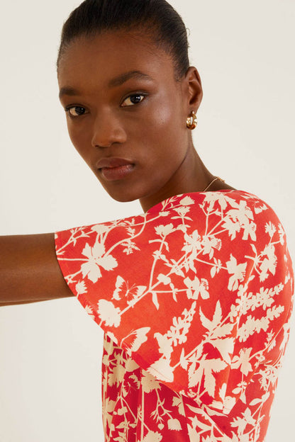 Red floral short-sleeve blouse with V-neck detail