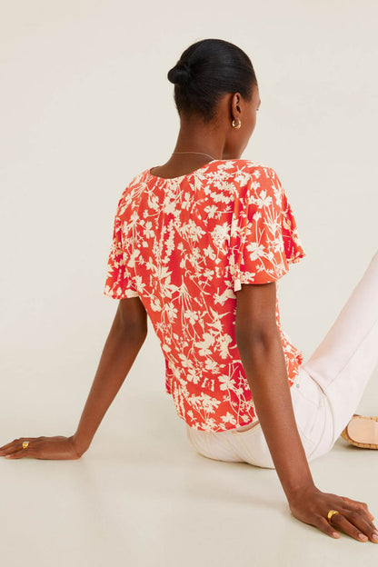 Red floral short-sleeve blouse, gathered back drape