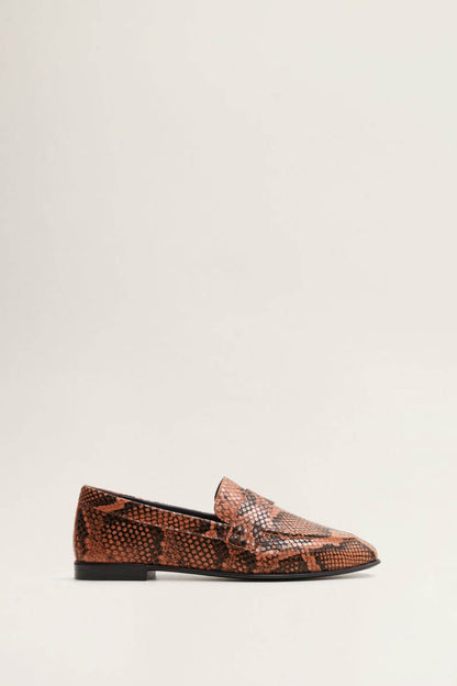 Orange-brown snake-print slip-on loafers with black sole