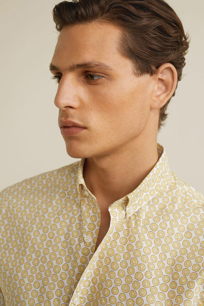 Yellow micro-pattern shirt close-up of collar and button placket