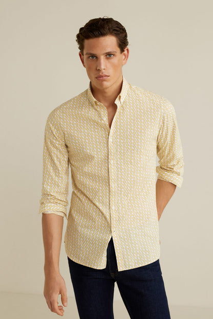 Yellow micro-pattern button-up shirt with pointed collar and rolled sleeves