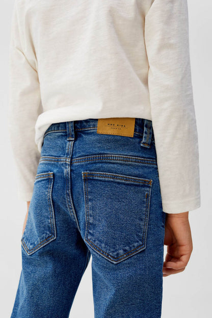 Kids' medium blue denim jeans, back yoke and contrast back pocket details