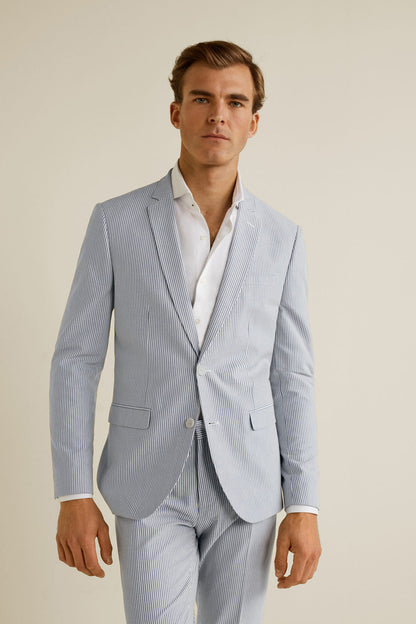 Light blue pinstripe suit blazer with notched lapel and two-button front