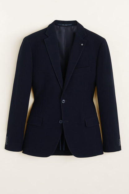 MANGO navy blazer with notch lapels, two button front and flap pockets