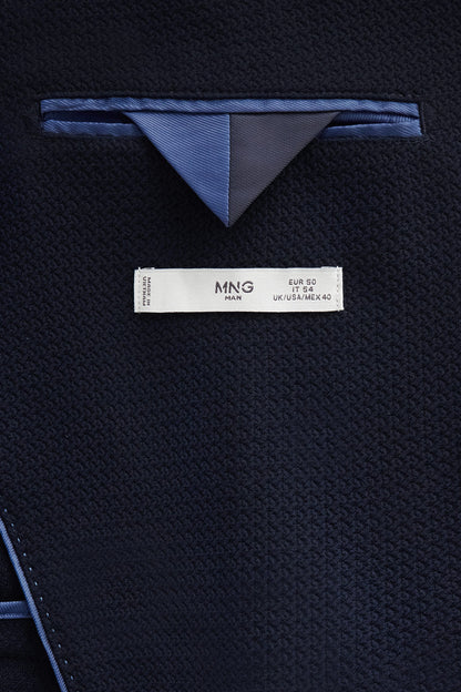 MANGO navy blazer collar detail with light blue trim and inner size label
