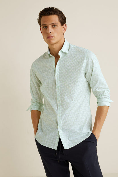 Light green patterned button-up shirt, long sleeves and spread collar