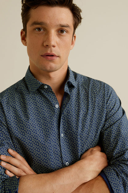 Men's dark navy patterned button-up shirt collar and button placket close-up