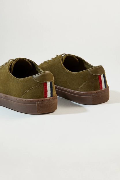 Khaki suede sneakers with striped heel tab and brown rubber sole
