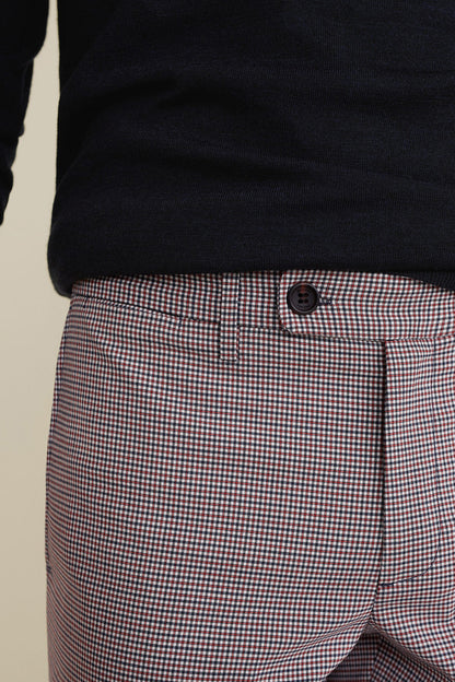Men's red and blue check trousers waistband with button closure and belt loops
