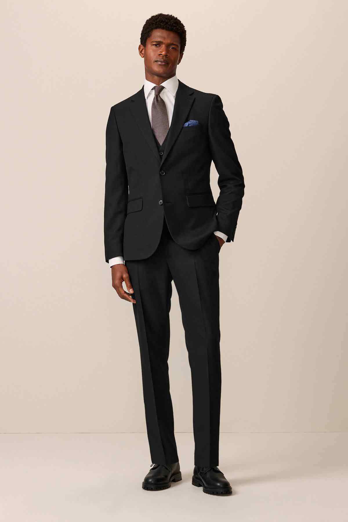Black tailored trousers front view, slim straight fit with side pockets