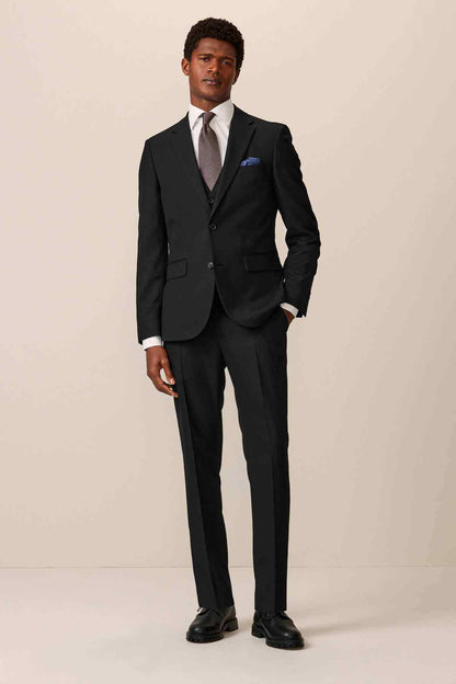 Black tailored trousers front view, slim straight fit with side pockets