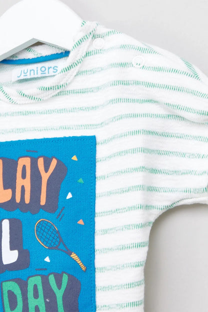 Baby T-shirt close-up: mint-striped white fabric with blue “PLAY ALL DAY” print