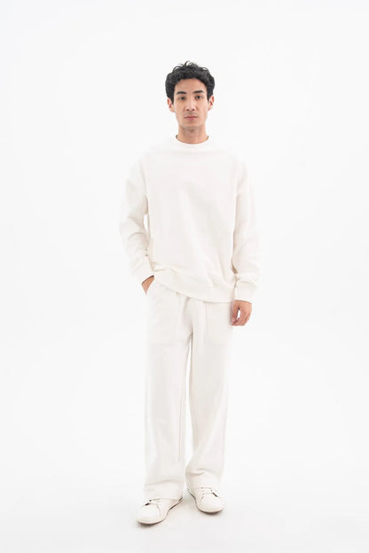 Off-white crewneck sweatshirt with matching sweatpants, full outfit front view