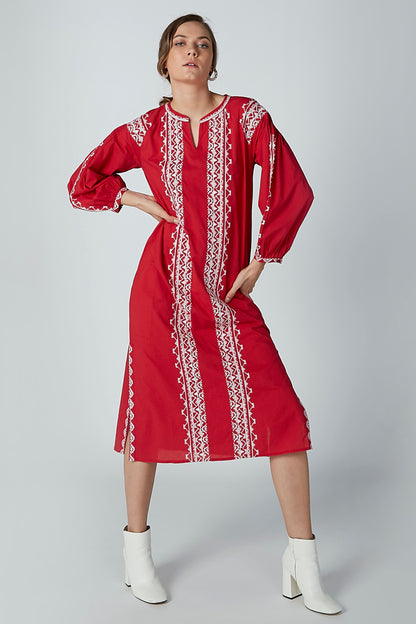 Red embroidered tunic dress with long balloon sleeves and vertical white trim