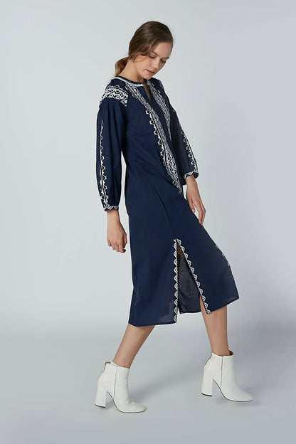 Navy midi dress with white embroidered trim and V-neck, full sleeves