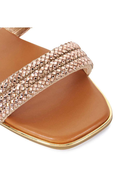 Embellished sandal with gold rhinestone cross straps and tan footbed close-up