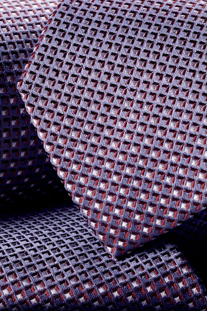 Charles Tyrwhitt purple geometric necktie pattern close-up