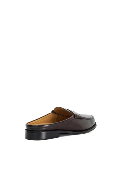 Brown leather slip-on loafer with low black outsole