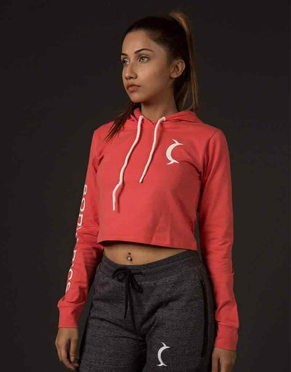 Cropped red hoodie with white drawstrings and front crescent logo