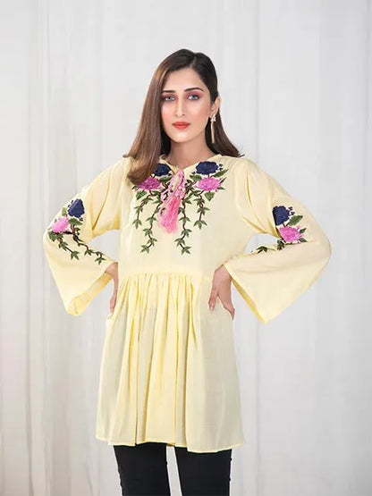 Women’s yellow embroidered tunic with pink and navy floral front and gathered yoke