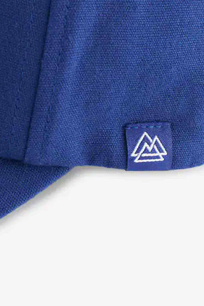 Cobalt blue fabric baseball cap with embroidered logo label