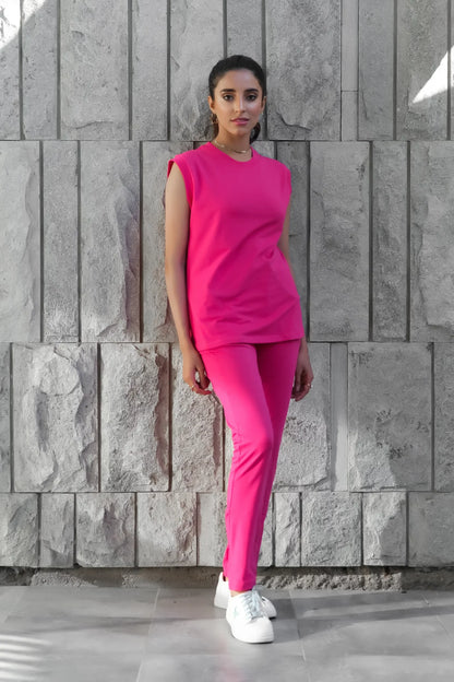 Dhaga fuchsia sleeveless top and jogger pants set with white sneakers