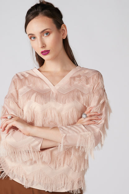 Beige fringe blouse with ruffled yoke and V-neck, long sleeves