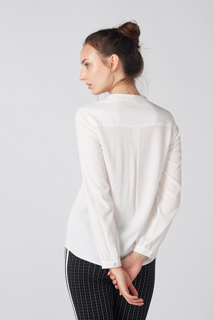 White back view button-front blouse with gathered yoke and long sleeves