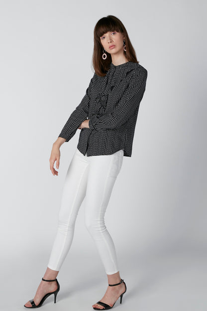 Black and white dot-pattern blouse with tie-front, long sleeves