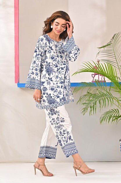 Dhaga blue floral tunic with patterned cuffs and matching white printed pants