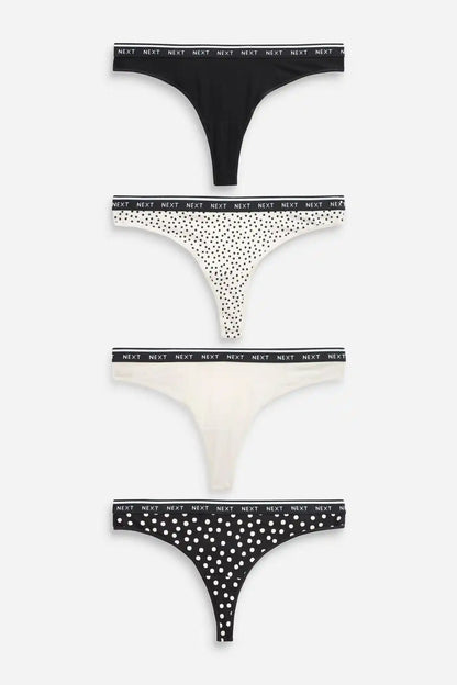 Thongs multipack with black solid, cream, and polka-dot prints