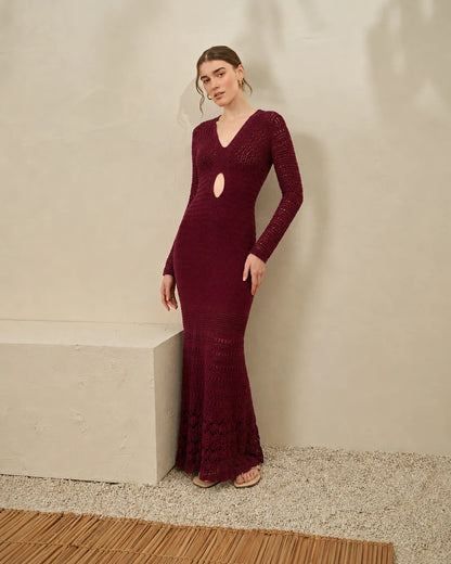 Maroon fitted knitted maxi dress with V-neck oval cutout and long sleeves
