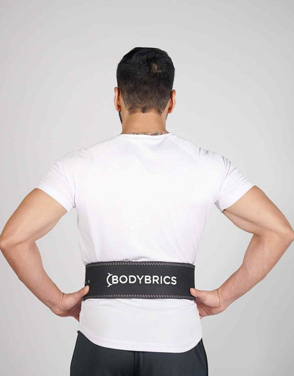 White compression T-shirt, back view, with Bodybrics logo at waist hem