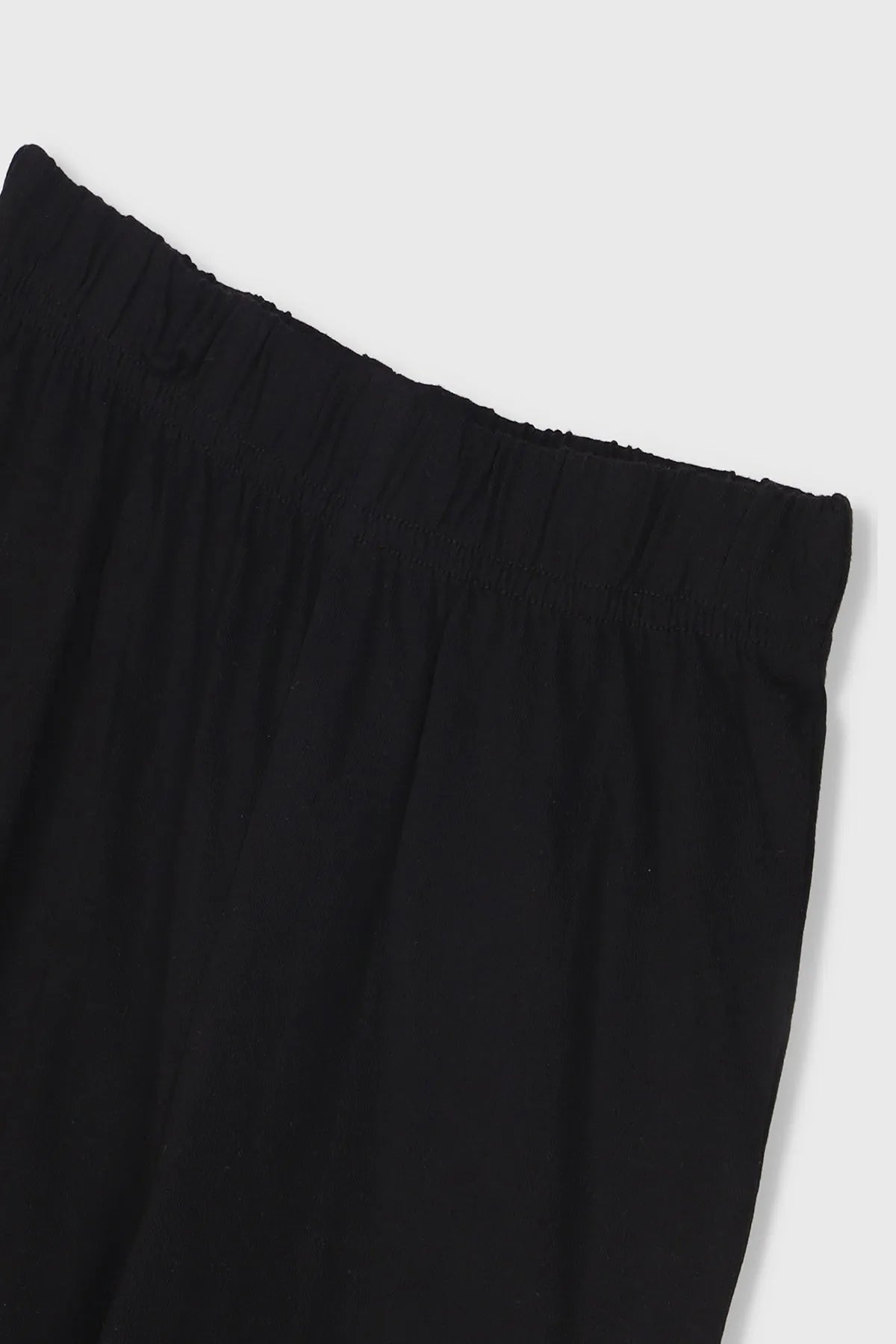 Black jogger pants with elastic waistband and ribbed cuffs