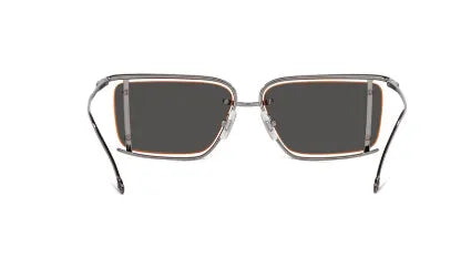 Diesel sunglasses, front angled view, dark tinted lenses, metal frame with orange accents