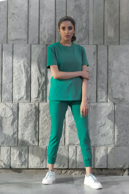 Dhaga teal scrub set with short-sleeve top and ankle jogger pants, cuffed hem