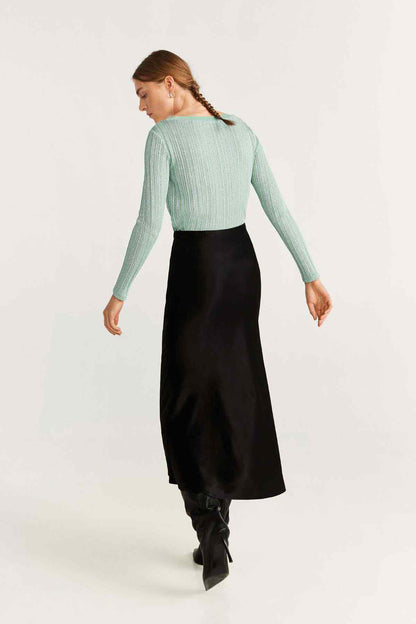 Mint green long-sleeve ribbed knit top with crew neck, back view