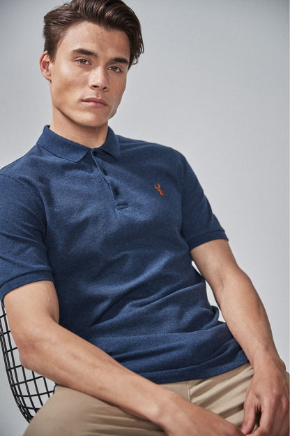 Men's navy polo shirt with short sleeves, button placket, and small chest logo