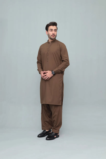 Men's brown long kurta with matching shalwar, full-body front view