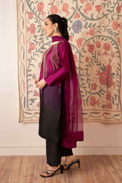Magenta tunic with sheer dupatta and black pants, side view