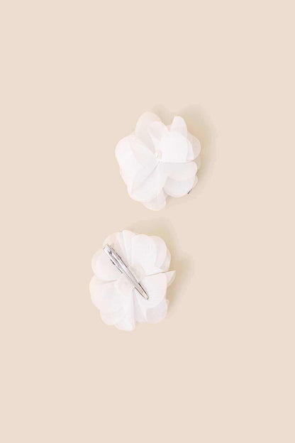 Ivory fabric flower hair pin with silver-toned needle center