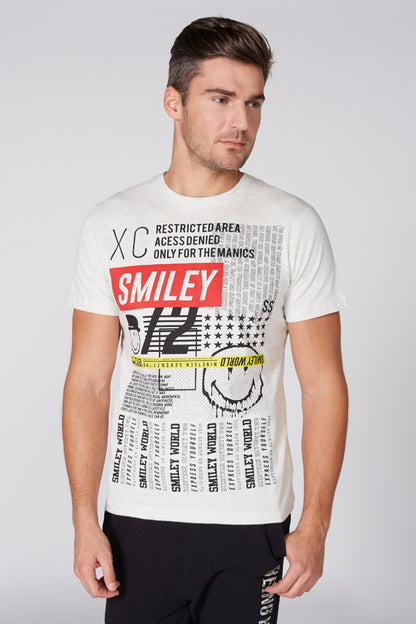 Men's white graphic T-shirt with Smiley print and black pants