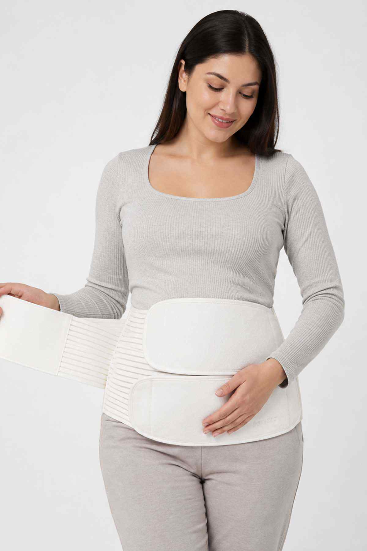 Cream belly support belt with fold-over panel and elastic rib side sections