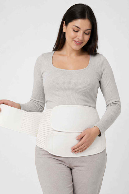 Cream belly support belt with fold-over panel and elastic rib side sections