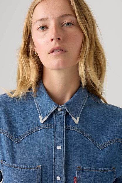 Women's Levi's med indigo denim shirt close-up of collar and front buttons