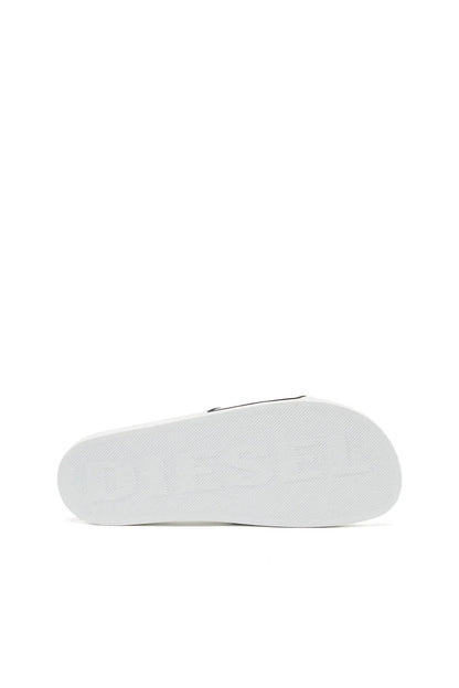 White slide sandals side view with cushioned, contoured footbed