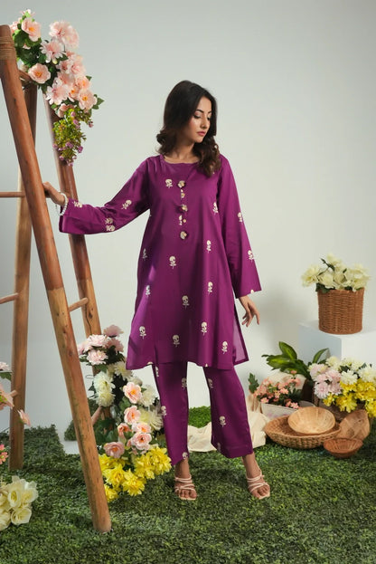 Purple kurta set with allover embroidered motifs, flared tunic and leggings