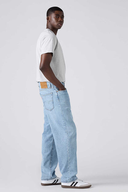 Levi's light-wash denim jeans with back patch and straight leg silhouette
