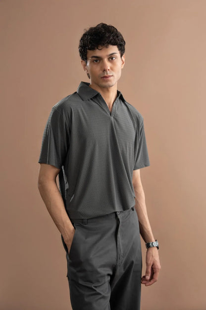 Men's grey short-sleeve button-up shirt with pointed collar; dark grey trousers