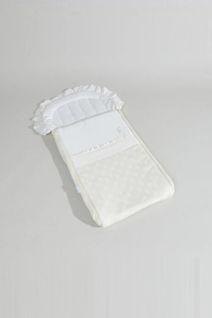 BABYSHOP cream newborn swaddle blanket with ruffled top and textured fabric